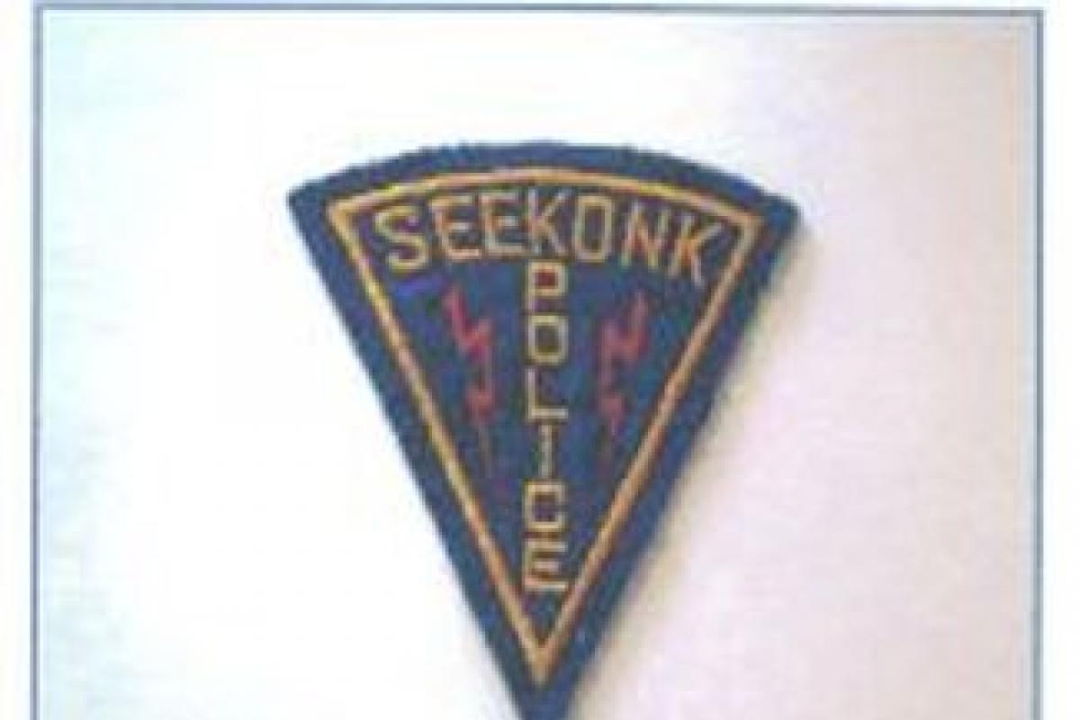 A Seekonk Police Patch depicting lighting bolts
